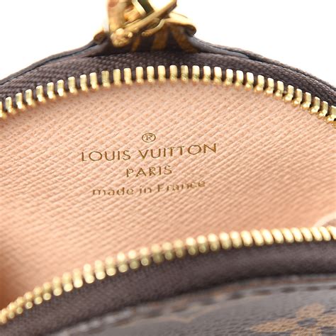 louis vuitton coin pouch with london milan designed on it|louis vuitton football player.